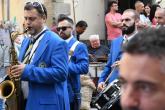 Grande_Ernesto De Luca - Caldarrostaro_insensibile_alla_musica_osserva_il_lavoro_del_suo_dipendente